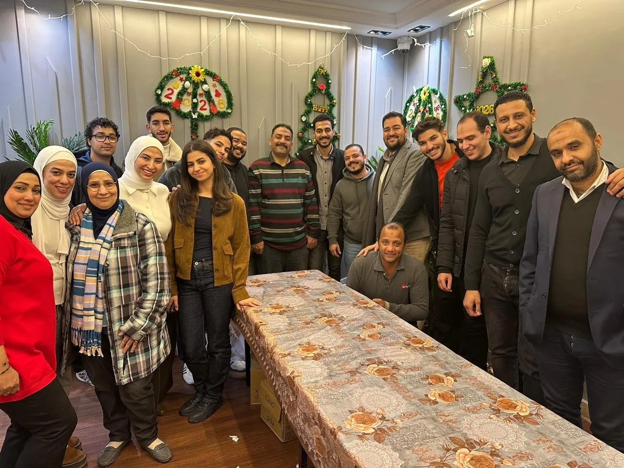 Participants of a WAFA corporate team engagement session gathered around the activity table